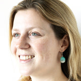 Wear Emerald Sea earrings and remember times spent at the beach