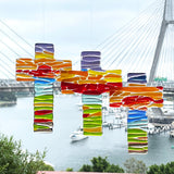 Fused glass suncatcher cross in rainbow colours, handmade in Australia