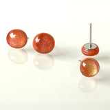 Dichro | Salmon stud earrings