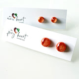Dichro | Salmon stud earrings