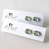 Dichro | Sparkly Silver and Golden stud earrings