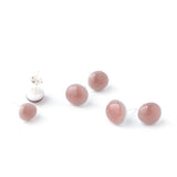 Round purple glass studs