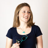 Wear an Emerald Sea necklace and remember times spent at the beach