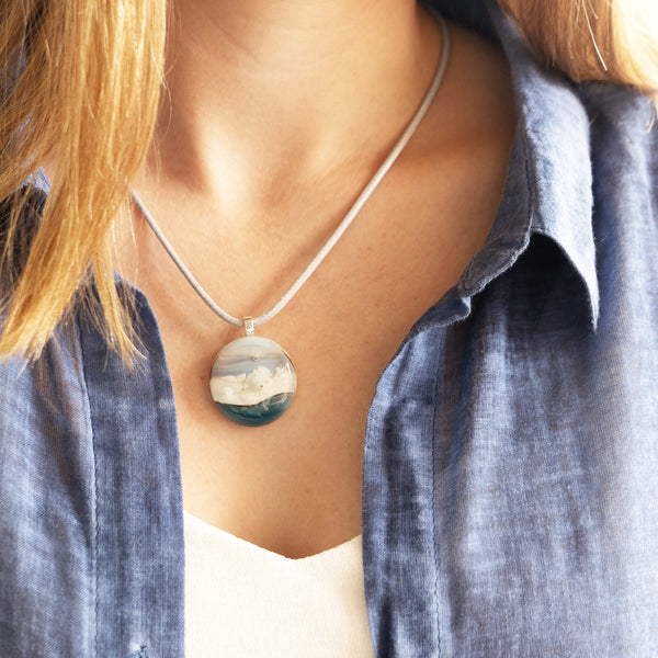 Model wears Icy Shore pendant, remembering times spent at the beach