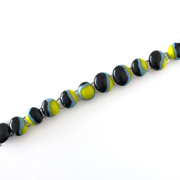dark and light blue bracelet with lime green accents