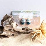Wear Icy Shore earrings and remember times spent at the beach