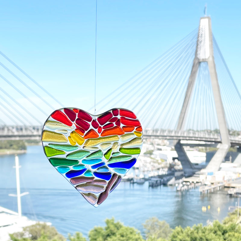 heart shaped suncatcher in the colours of the rainbow